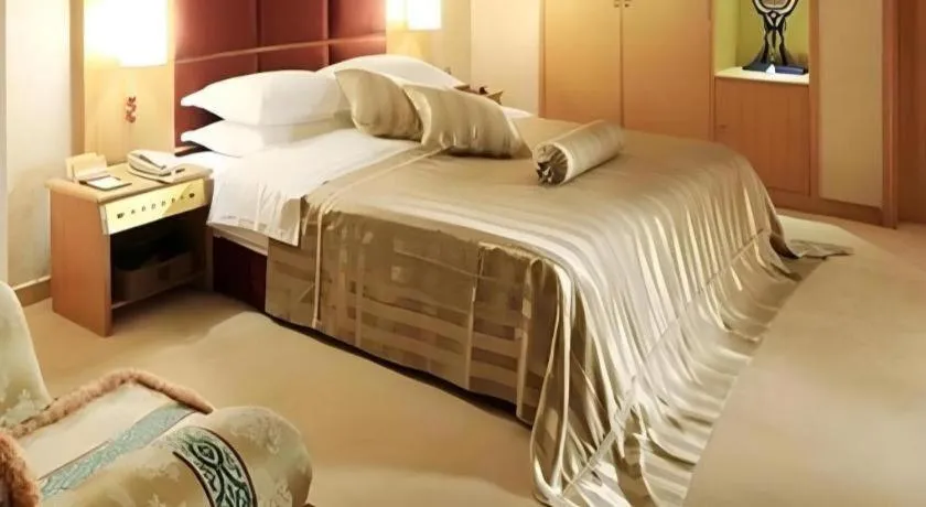 Bed in Economic Trade Hotel