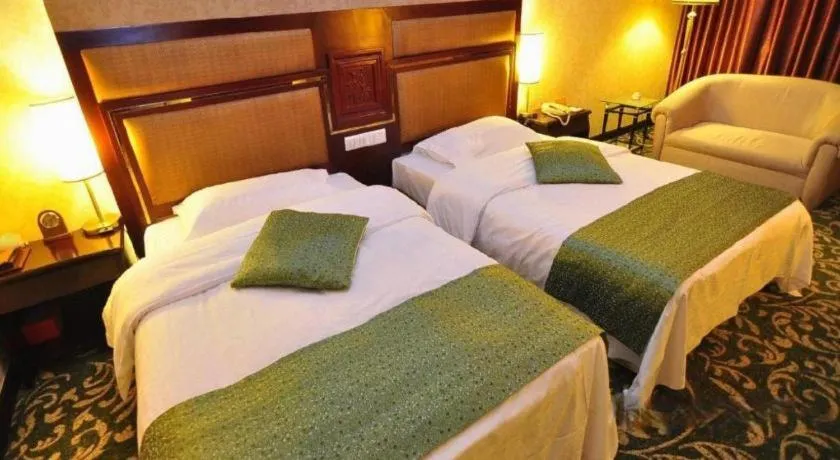 Bed in Economic Trade Hotel