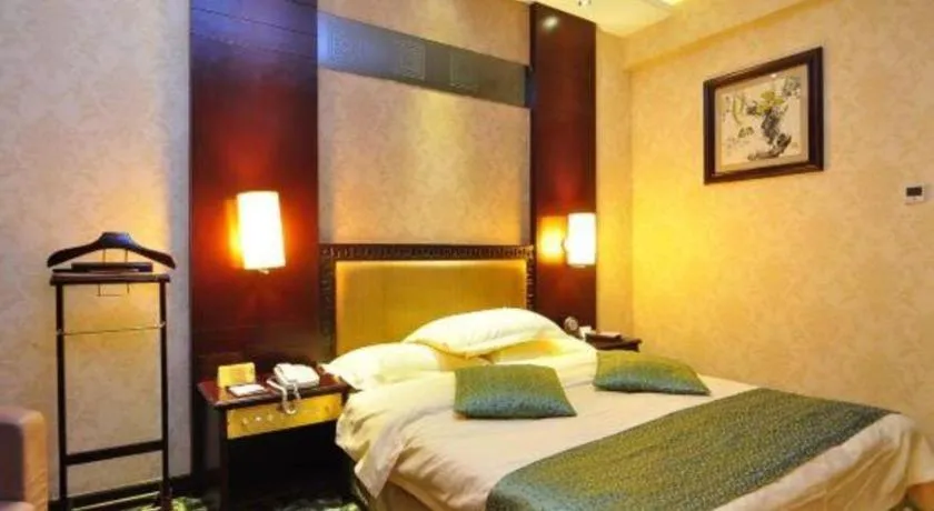 Bed in Economic Trade Hotel