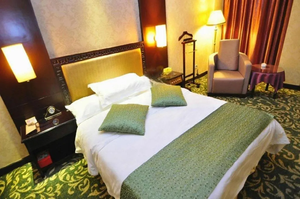 Bed in Economic Trade Hotel