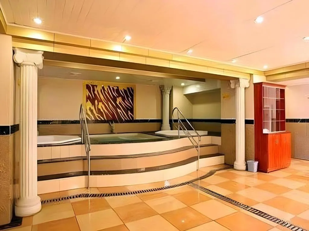 Bed in Economic Trade Hotel