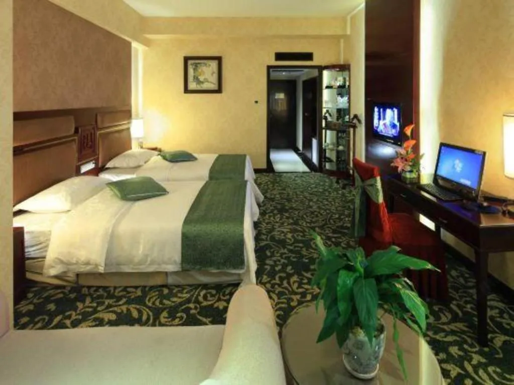 Bed in Economic Trade Hotel