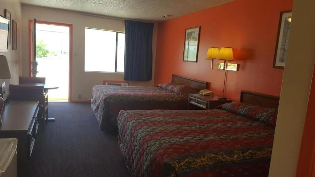 Bed in Regency Inn Breckenridge