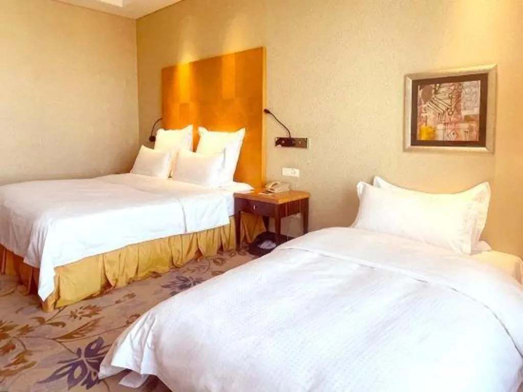 Bed in Kunshan Newport Hotel