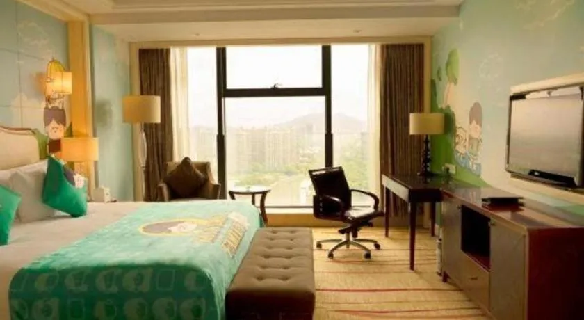 Bed in New Century Grand Hotel Zhejiang Sanli