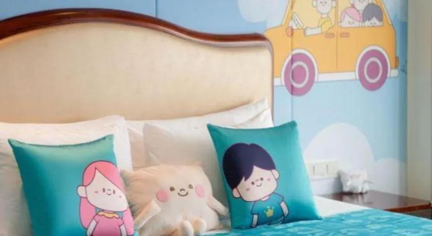 Bed in New Century Grand Hotel Zhejiang Sanli