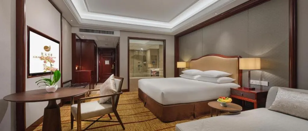 Bed in New Century Grand Hotel Zhejiang Sanli