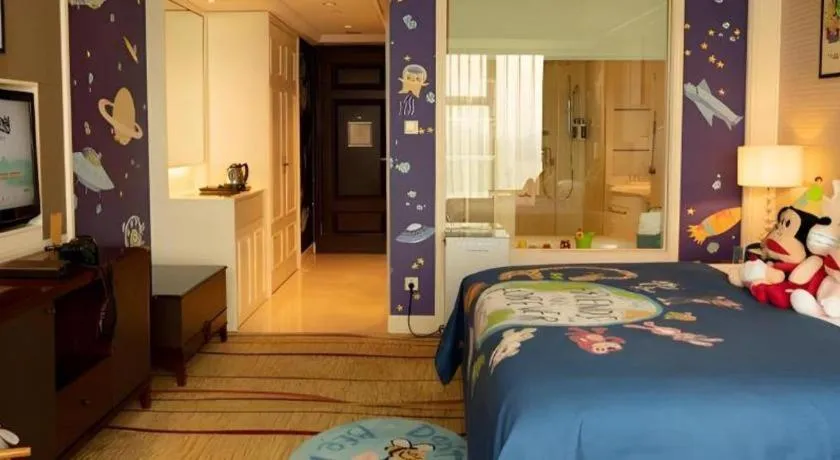 Bed in New Century Grand Hotel Zhejiang Sanli