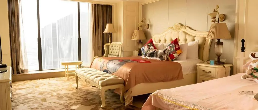 Bed in New Century Grand Hotel Zhejiang Sanli
