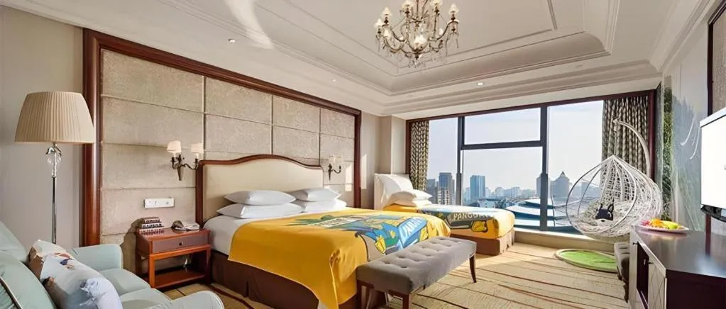 Bed in New Century Grand Hotel Zhejiang Sanli