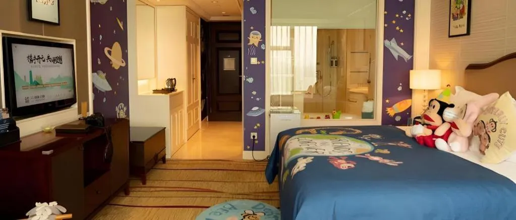 Bed in New Century Grand Hotel Zhejiang Sanli