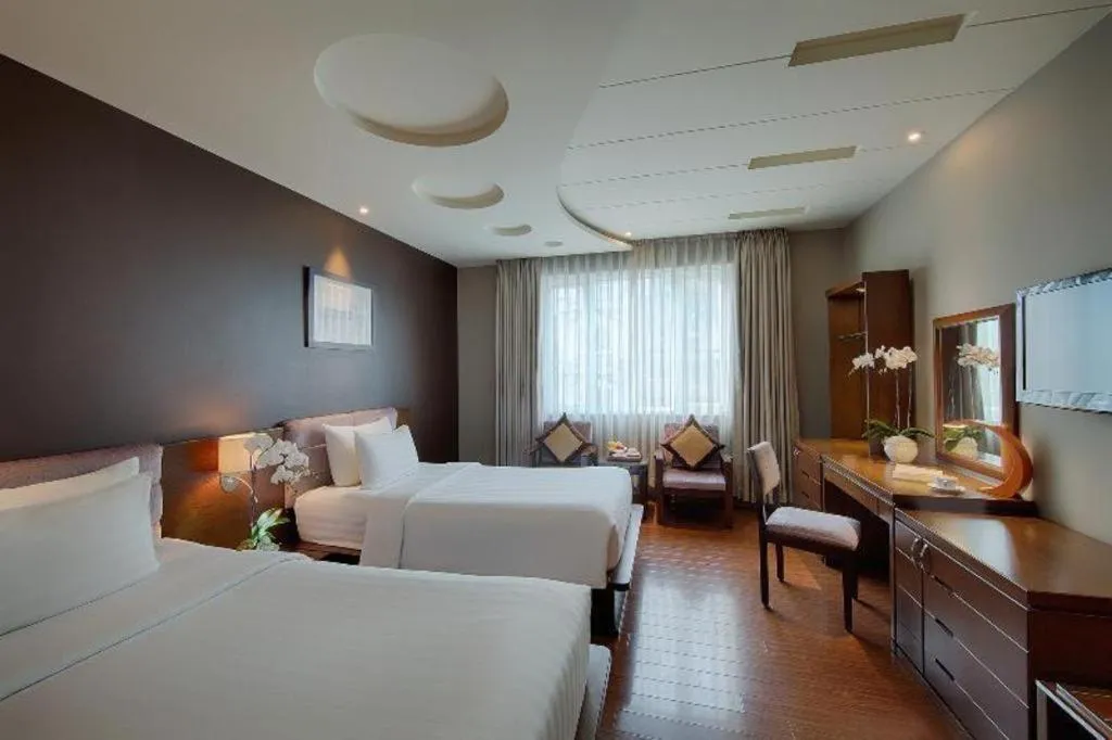 Bed in Grand Silverland Hotel