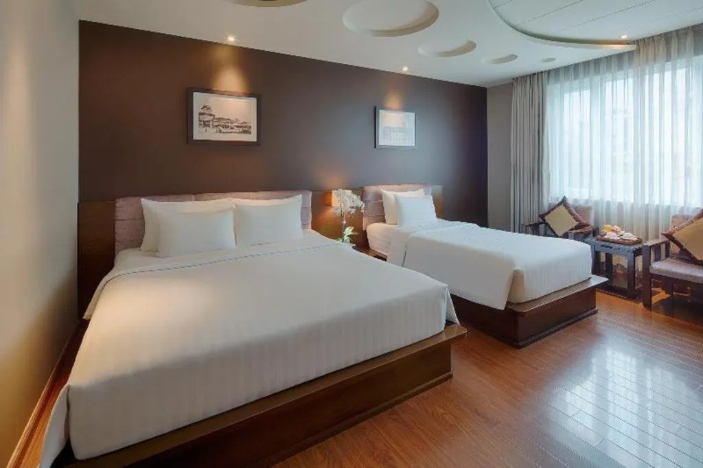 Bed in Grand Silverland Hotel