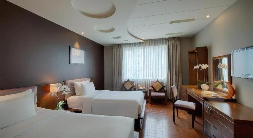 Bed in Grand Silverland Hotel