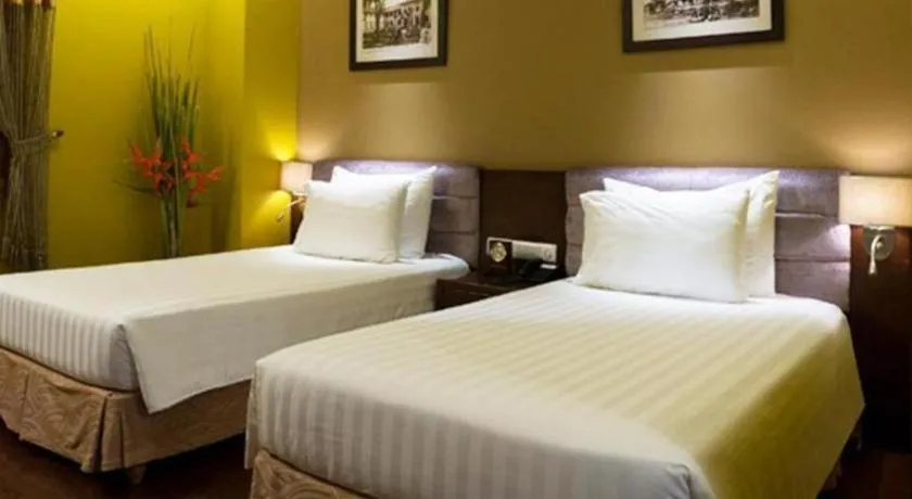 Bed in Grand Silverland Hotel