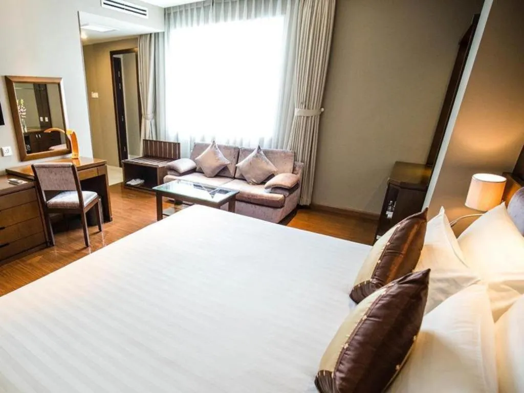 Bed in Grand Silverland Hotel