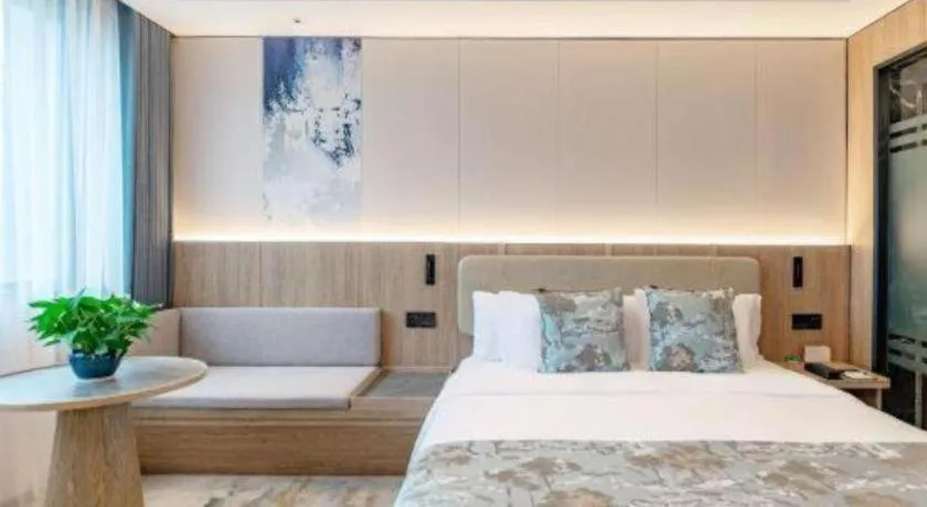 Bed in Jiaxing Fortune Holiday Hotel