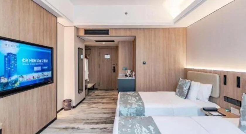 Bed in Jiaxing Fortune Holiday Hotel