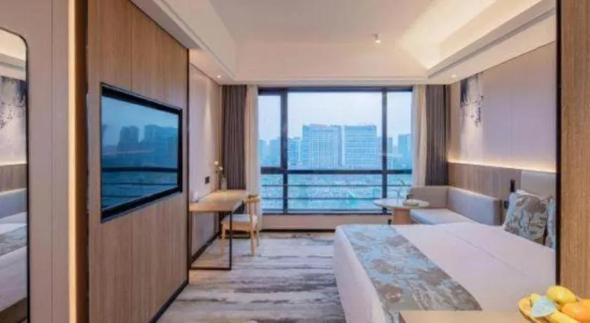 Bed in Jiaxing Fortune Holiday Hotel