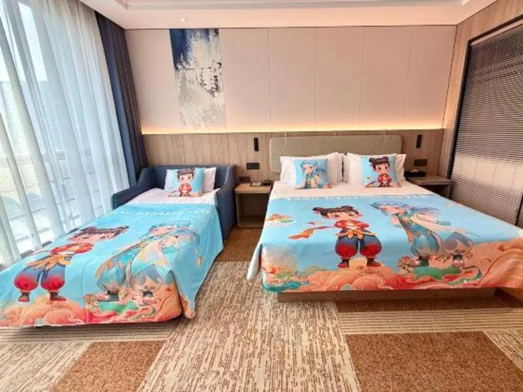 Bed in Jiaxing Fortune Holiday Hotel