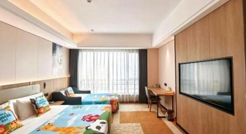 Bed in Jiaxing Fortune Holiday Hotel