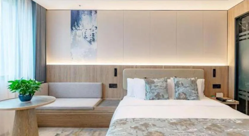 Bed in Jiaxing Fortune Holiday Hotel