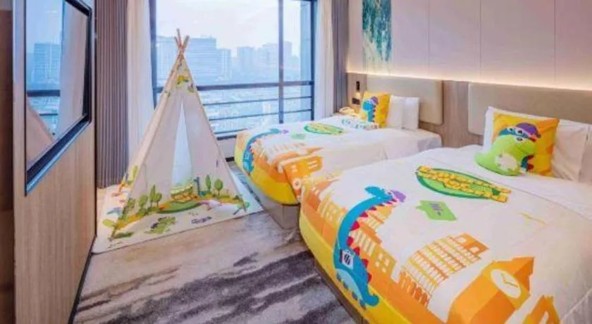 Bed in Jiaxing Fortune Holiday Hotel