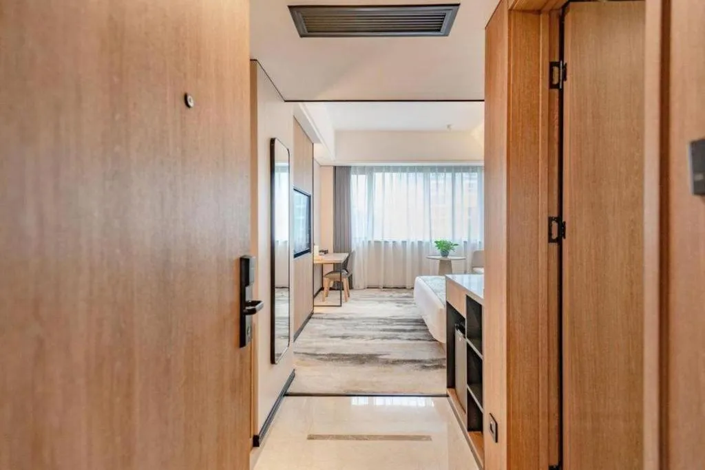 Bed in Jiaxing Fortune Holiday Hotel