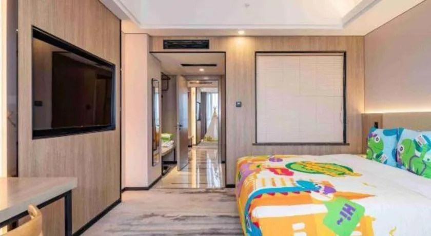 Bed in Jiaxing Fortune Holiday Hotel