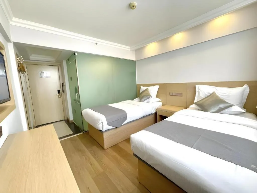 Bed in GreenTree Inn Urumqi South Xinhua Road Hotel