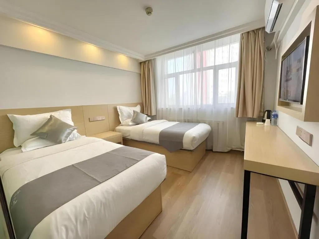 Bed in GreenTree Inn Urumqi South Xinhua Road Hotel