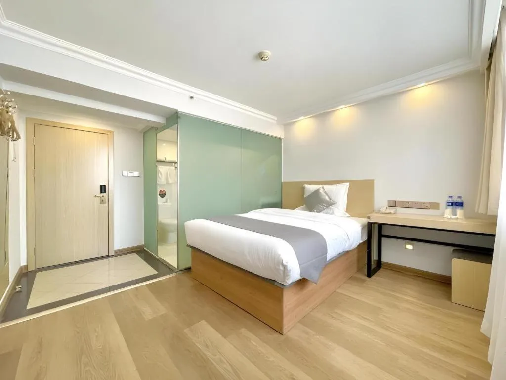 Bed in GreenTree Inn Urumqi South Xinhua Road Hotel