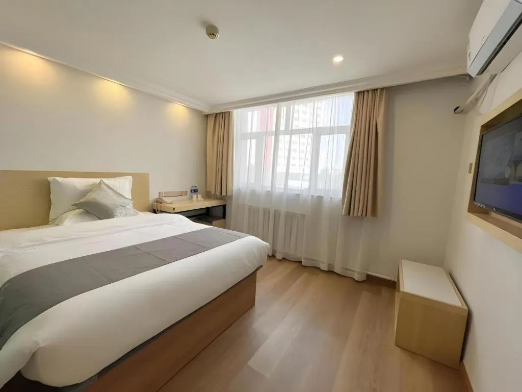 Bed in GreenTree Inn Urumqi South Xinhua Road Hotel