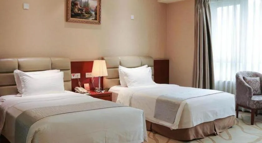 Bed in Chengdu Sovereign Hotel