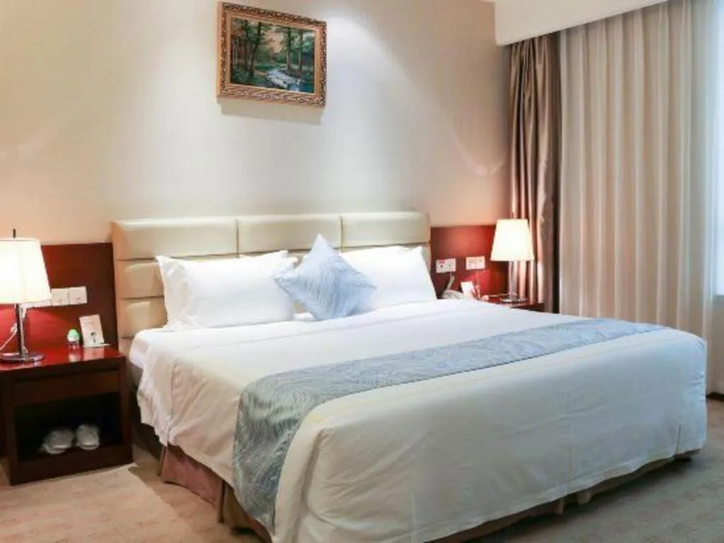 Bed in Chengdu Sovereign Hotel