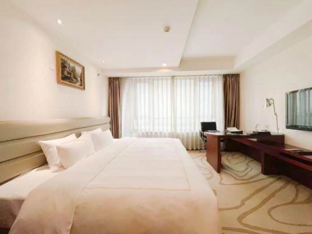 Bed in Chengdu Sovereign Hotel