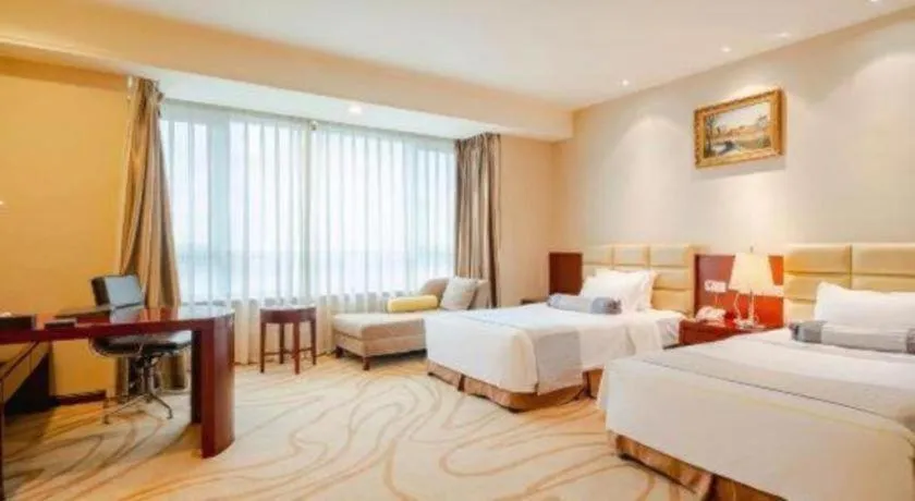 Bed in Chengdu Sovereign Hotel