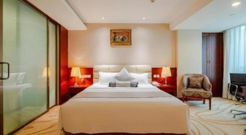 Bed in Chengdu Sovereign Hotel