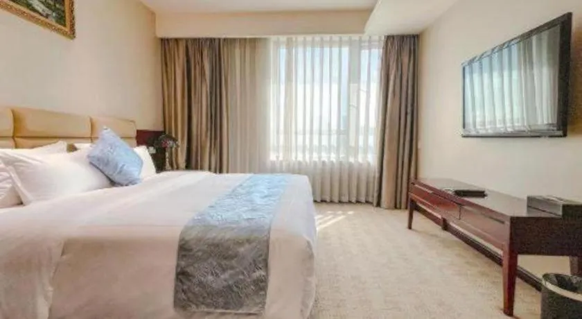 Bed in Chengdu Sovereign Hotel