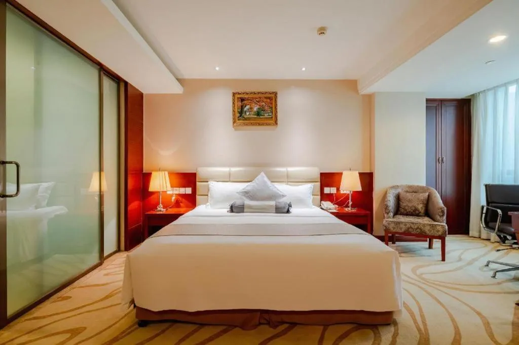 Bed in Chengdu Sovereign Hotel