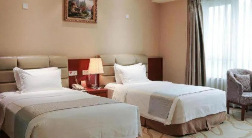 Bed in Chengdu Sovereign Hotel