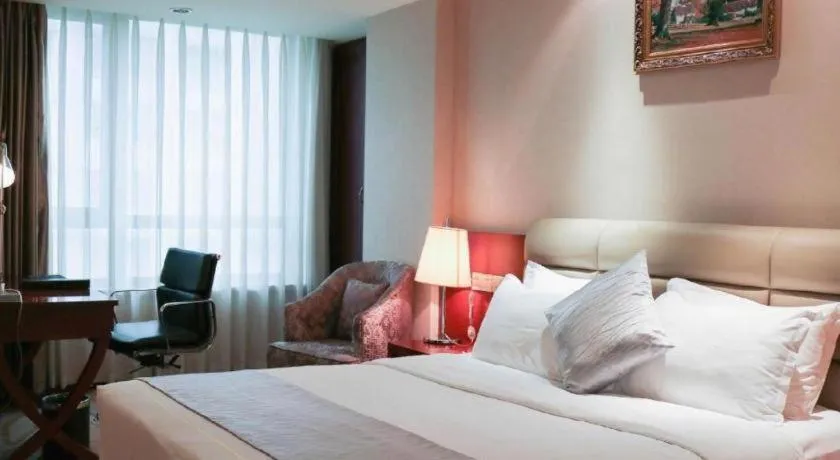 Bed in Chengdu Sovereign Hotel