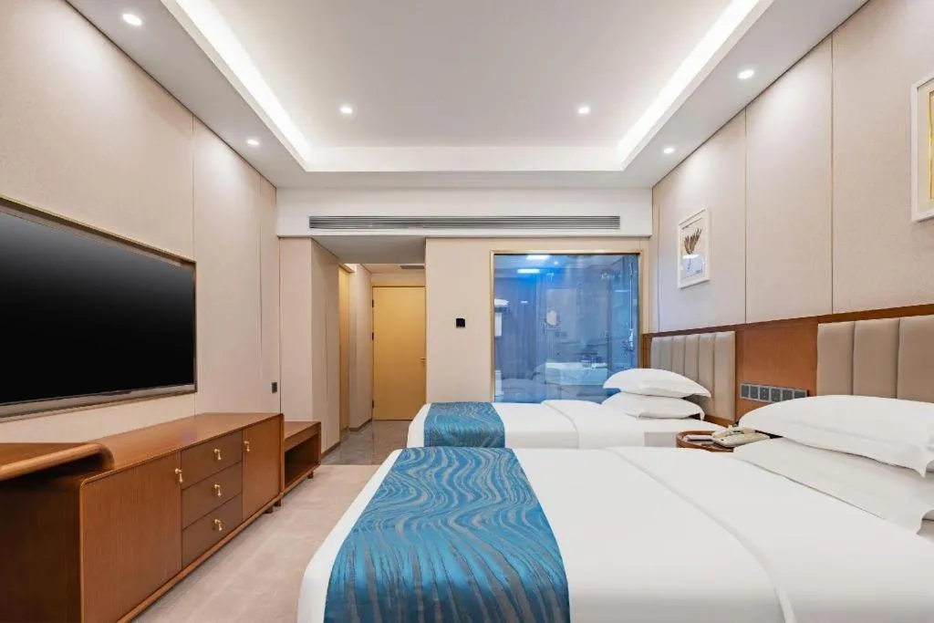 Bed in Yichang Three Gorges Project Hotel