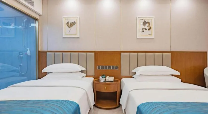 Bed in Yichang Three Gorges Project Hotel