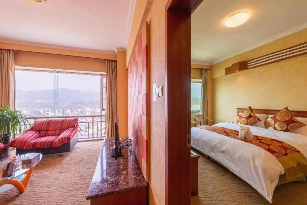 Bed in Yichang Three Gorges Project Hotel