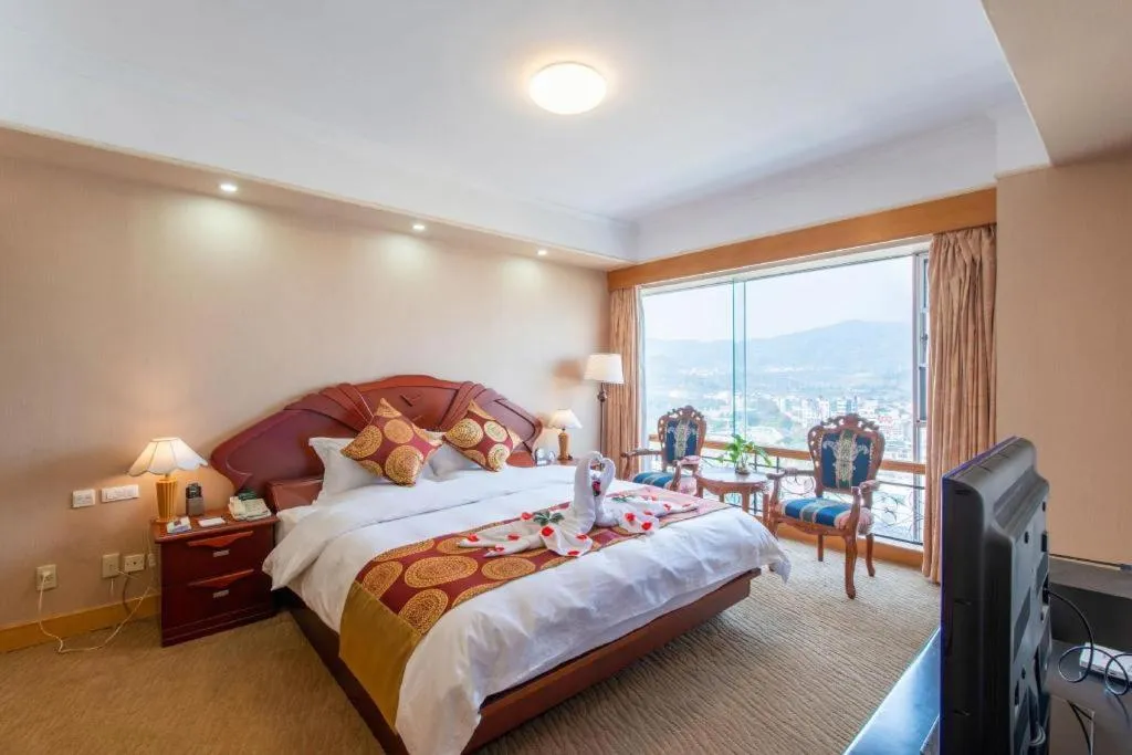 Bed in Yichang Three Gorges Project Hotel