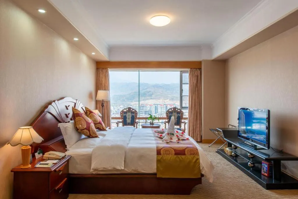 Bed in Yichang Three Gorges Project Hotel