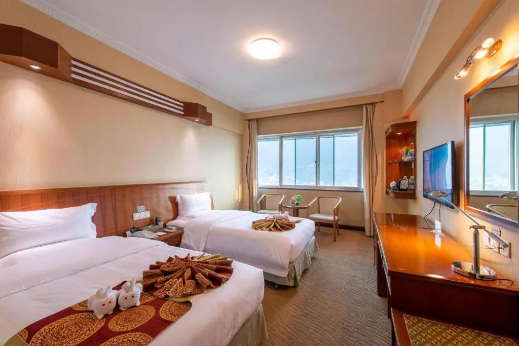 Bed in Yichang Three Gorges Project Hotel