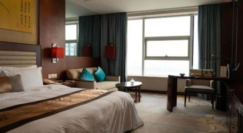 Bed in Fuyang International Trade Centre Hotel