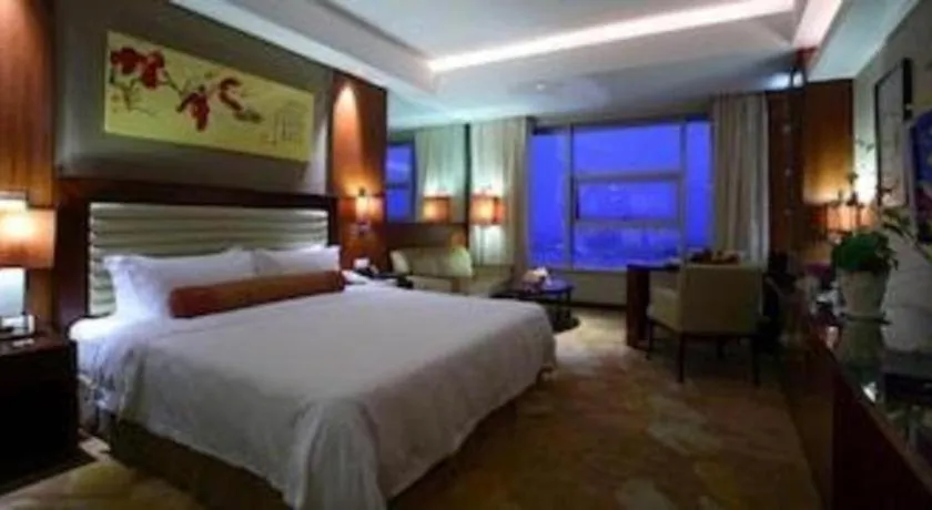 Bed in Fuyang International Trade Centre Hotel